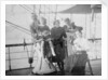 Group portrait including Mr Hill of the Seamen's Institution on deck, at Iquique, Chile by unknown