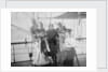 Group portrait including Mr Hill of the Seamen's Institution on deck, at Iquique, Chile by unknown