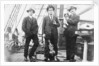 Second Officer, Captain H.J. Bray (with dog Ollie) and Chief Officer standing on deck, at Tacoma, USA by unknown