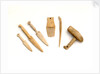 Ivory model of a snow knife, awl, comb by unknown