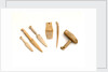 Ivory model of a snow knife, awl, comb by unknown
