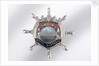 Enamelled metal brooch by unknown