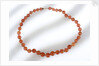 Amber beads by unknown