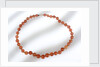 Amber beads by unknown