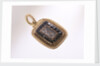 Gold pendant by unknown
