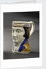 Earthenware mask mug by unknown