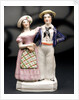 Earthenware figure group depicting a sailor and lass by unknown