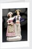 Earthenware figure group depicting a sailor and lass by unknown