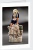 Earthenware figure of a lass by unknown
