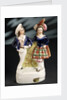 Earthenware figure group depicting a sailor and lass by Unknown