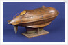 Full hull model, life-saving capsule, starboard stern quarter by R. F. Wells