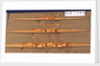 Full hull model, 2 oared single skull, port broadside by unknown