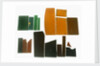 Eighteen pieces of coloured glass (five amber, three crimson, four dark green, six purple) in a bag by unknown