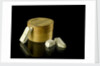 Pill box containing eight chalky plaster like crystals by unknown
