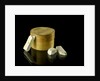 Pill box containing eight chalky plaster like crystals by unknown