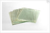 Thirteen clean cut glass squares in a box by unknown