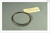 Roll of brass wire in a bag by unknown