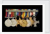 Medals awarded to Cdr J. L. Younghusband DSC (reverse, r to l, MED1228-1235) by Garrard & Co.