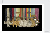 Medals awarded to Commander Peter Worth DSC (obverse, l to r, MED2002-2009) by unknown