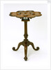 Mahogany supper table with tripod base by unknown