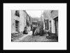 Newlyn Court, Cornwall. Old houses with fisher folk by Francis Frith & Co.