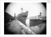 The 'Dotterel' (Br, 1936) alongside berth at Southampton with a damaged bow, slightly distant. The paddle steamer 'Portsdown' (1928) is berthed close by by unknown