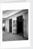 Passenger elevators in the Grand Entrance on the 'Aquitania' (1914) by Bedford Lemere & Co.