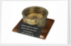 A magnetic dry-card compass of a type patented by Henry Jennings in 1818 (no. 4259) by Jennings and Company