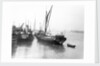 The 'Olive May' (1920), a port quarter view of the barge motoring to quayside with her tender in tow (sails furled) by Anonymous