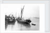The 'Olive May' (1920), a port quarter view of the barge motoring to quayside with her tender in tow (sails furled) by Anonymous