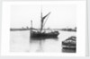 The 'Olive May' (1920), a port bow view of the barge stopped with sails furled by Anonymous