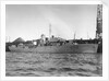 Photograph of starboard view just forward of the broadside of HMS 'Rhododendron' (1940) dated pre October 1942 alongside quay. Pendant K78. by unknown