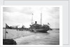 HMS 'Titania' (1915) submarine depot ship, moored at Portland with 6 submarines alongside by unknown