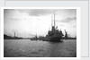HMS 'Titania' (1915) submarine depot ship, moored at Portland with 4 submarines alongside by unknown
