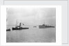 Rescue tug HMS 'Vanquisher' (1899) entering the floating dock at Harwich with the mined destroyer 'Thisbe' (1917) in tow by unknown