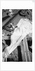 Repairing a spread sail on the forecastle by Alan Villiers