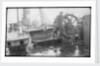 The 'Herzogin Cecile' (Fi, 1902) a seaman at the midships wheel in heavy weather. The helmsman is wearing a safety harness by unknown