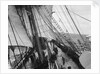 Unbending a topsail by Alan Villiers