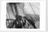 Unbending a topsail by Alan Villiers