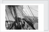 Unbending a topsail by Alan Villiers