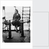 Elisabeth Jacobsenin shore clothes seated on the poop rail, aboard 4 masted barque 'Parma' (Fi, 1902), ex 'Arrow' (Ruben de Cloux) by Alan Villiers