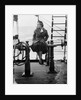 Elisabeth Jacobsenin shore clothes seated on the poop rail, aboard 4 masted barque 'Parma' (Fi, 1902), ex 'Arrow' (Ruben de Cloux) by Alan Villiers