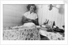 Elizabeth Jacobsen in her bunk by Alan Villiers