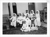 A Kuwaiti merchant at home with his family by Alan Villiers
