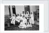 A Kuwaiti merchant at home with his family by Alan Villiers