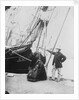 Photograph of John and Ann Gambles standing by the bow of the 'Ann Gambles' barque by unknown