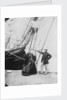 Photograph of John and Ann Gambles standing by the bow of the 'Ann Gambles' barque by unknown