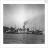 'Wing Sang' (Br, 1938), at anchor, surrounded by small craft by unknown