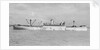 The 'Manchester Progress' (Br, 1938) under tow in port, topmasts struck by unknown