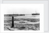 A view looking from the shore towards Shotley pier at low tide by Smiths Suitall Ltd.